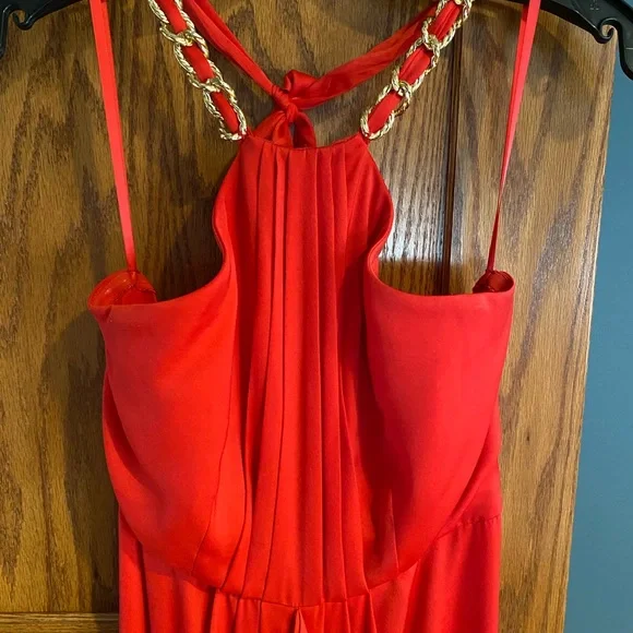 - BCBG red halter dress with gold chain neckline, Sz 4. Great for prom or